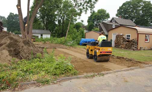 Compacting driveway