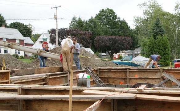 Pouring concrete into house stemwall