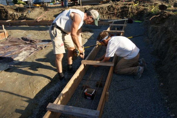 Adam putting in set-screws for the vertical rebar while I tie the horizontal rebar together.