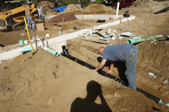 working-on-sub-slab-rough-in-plumbing