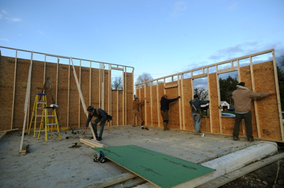 Raising the East wall - picture by Thom and Beth