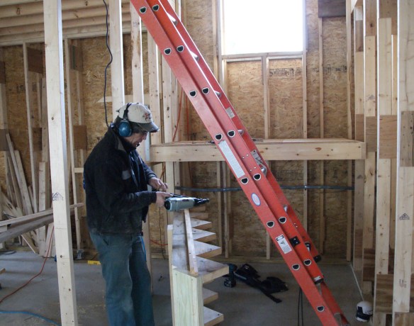 The lower half of the stairs being assembled