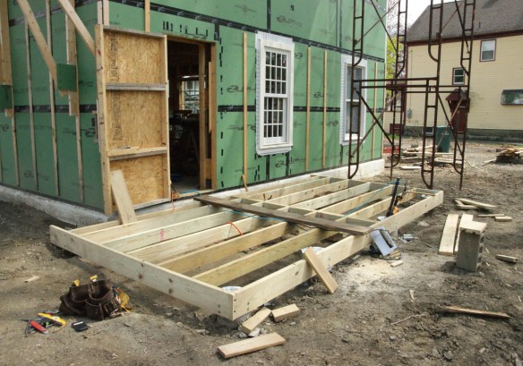 The joists for the porch installed