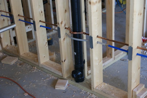 Water line supplies for kitchen and second floor bathroom drain