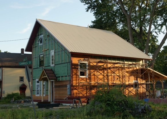 Tongue and groove red cedar siding clear stained on house