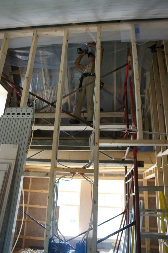 Adam installing bedroom ceiling tongue and groove boards