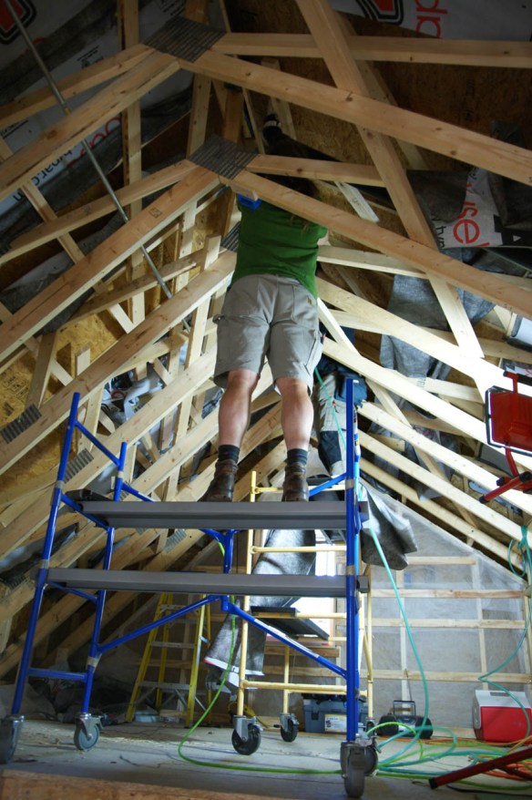 Our Uptight insulators installing Typar in the roof