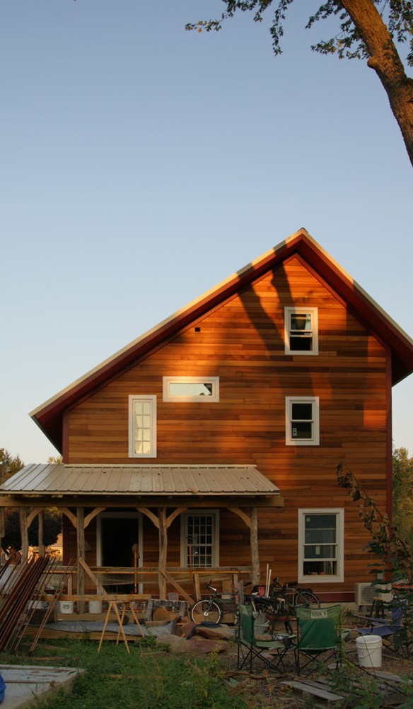 Sunset light on west face of house