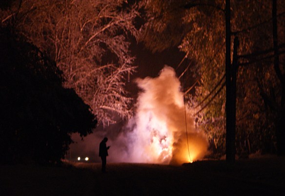 burning-power-line-transformer-on-ground